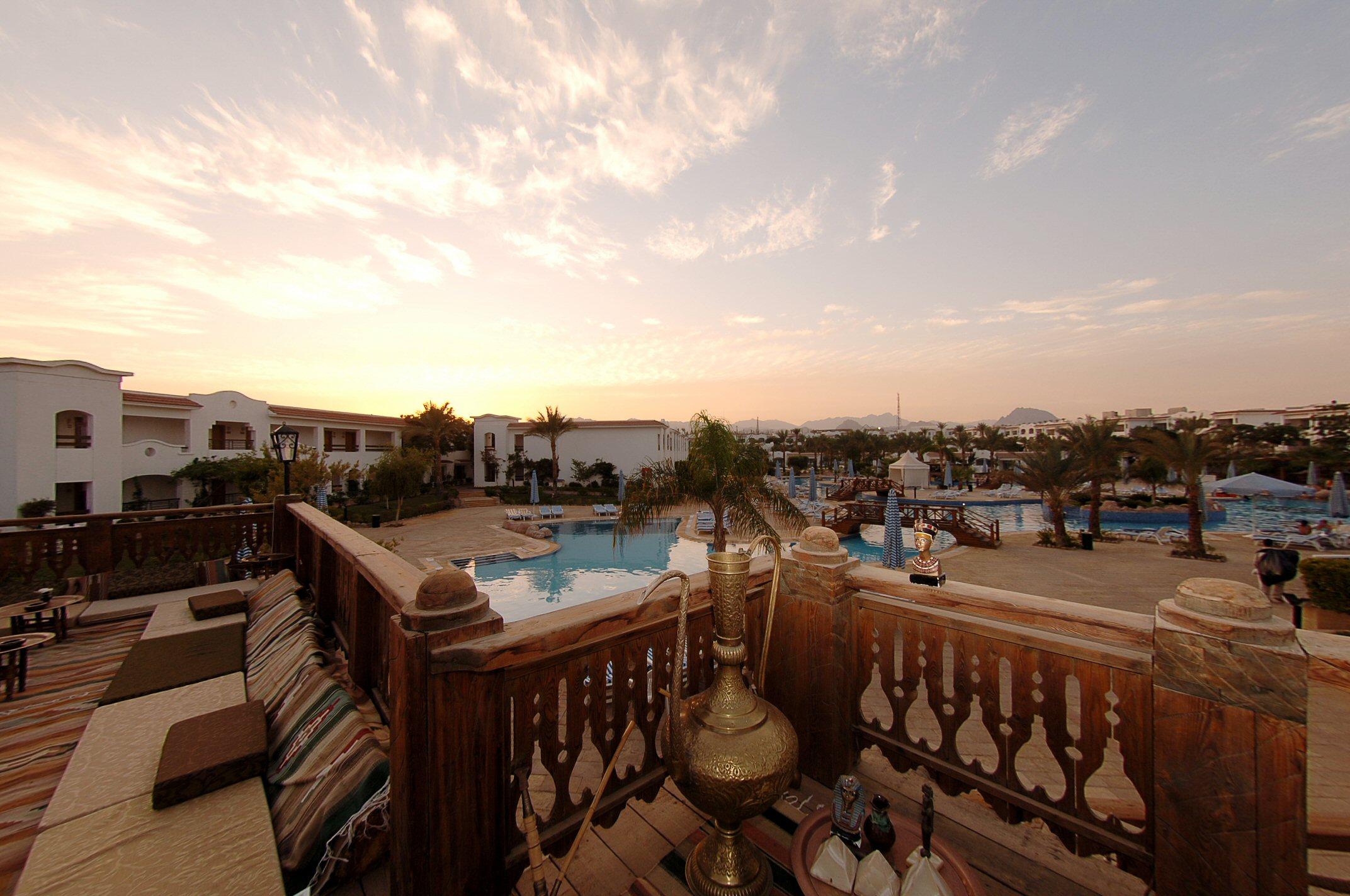 Jaz Sharm Dreams Hotel Exterior photo Sunset at the resort