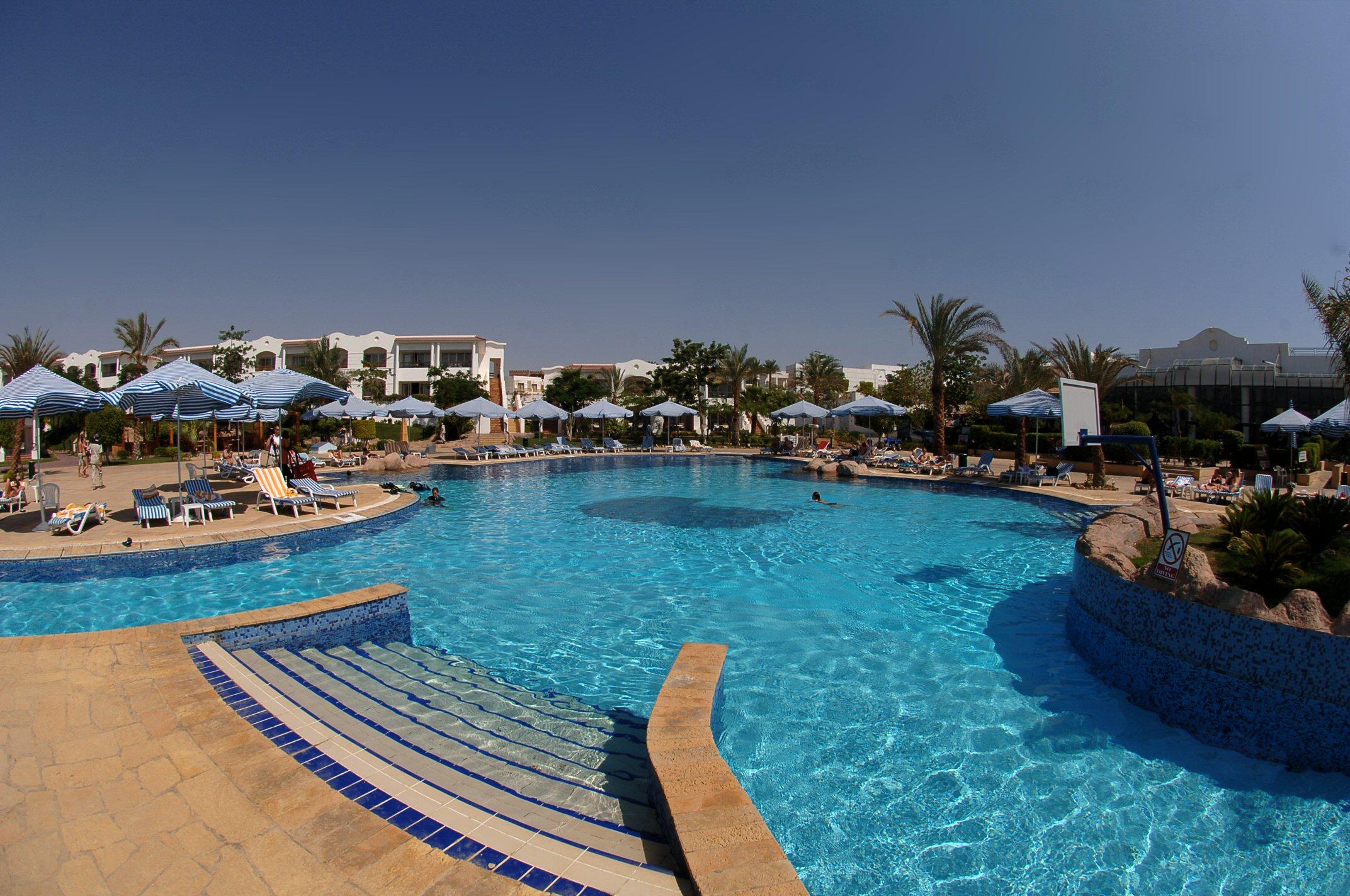 Jaz Sharm Dreams Hotel Exterior photo A swimming pool at a resort in Egypt