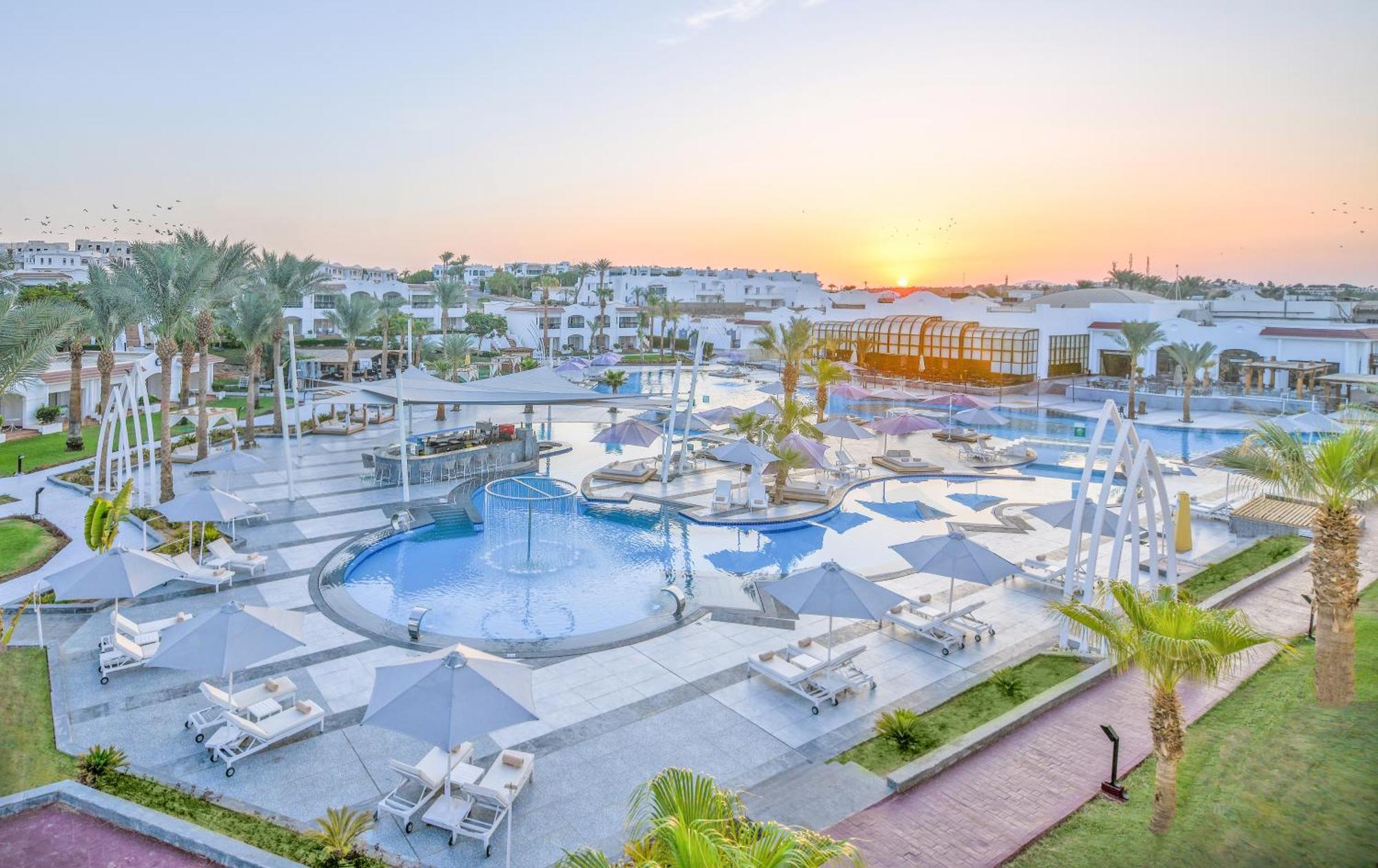 Jaz Sharm Dreams Hotel Exterior photo Sunrise at the Hilton Sharm El Sheikh